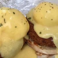 Crab Cake Benedict · Served with two poached eggs a top an english muffin with hollandaise sauce.