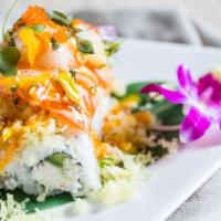 Snow White · Half-Cooked.  Crab meat and avocado roll, topped with scallop, salmon, and crunchy.