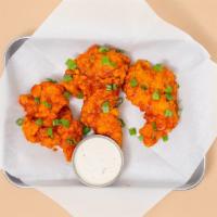 Sriracha Tenders · Three crispy fried chicken tenders covered in sriracha sauce with your choice of dipping sauce