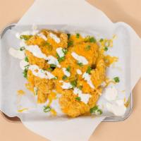 Cheese Tenders · Three crispy fried chicken tenders covered with cheese, scallions, and ranch.