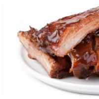Sweet and Savory Ribs - Half Rack · Half rack of ribs cooked with our Sweet and Savory BBQ sauce