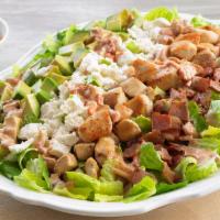 Cobb Salad · Mixed Greens, White Chicken Meat, Hard Boiled Egg, Grape Tomatoes, Cheddar and Monterey Jack...