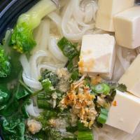 Tofu Noodle Soup · Thin rice noodles, soft tofu, bean sprouts, garlic, and green onions in a clear house broth....