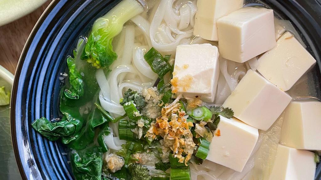 Tofu Noodle Soup · Thin rice noodles, soft tofu, bean sprouts, garlic, and green onions in a clear house broth. Substitute chicken for an additional charge.