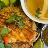 Tom Yum Fried Rice · Tom-Yum-Yummy!!! Grilled salmon, steamed vegetable over tom yum fried rice served with a cle...