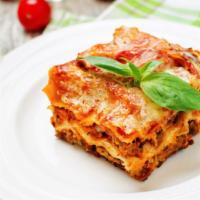 The Cheese Lasagna · Layers of lasagna filled with spinach, four kinds of cheese (mozzarella, ricotta, romano, an...