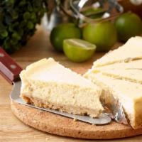 NY Style Cheesecake · Classic slice of New York style cheesecake with a creamy texture.