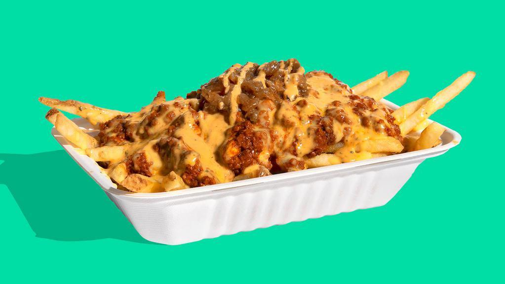The Shop Chili Cheese Fries · Step up your fry game with Impossible™ Chili & plant-based cheese sauce-smothered fries with chipotle crema & scallions.