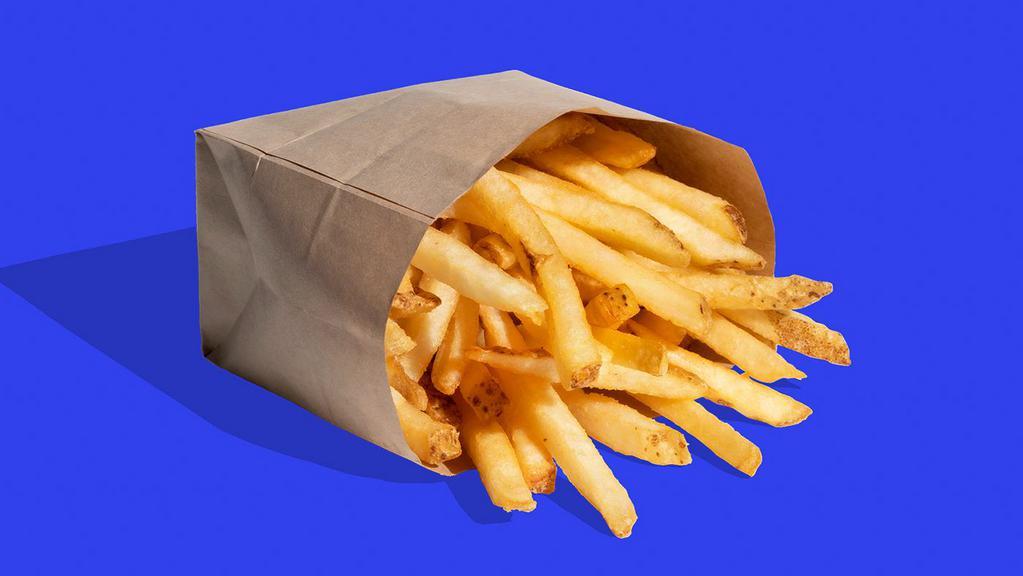 The Shop Fries · Just a simple side order of fries. If you want to put them inside of your burger, that’s totally up to you-Shop Sauce, Tso’s Sauce, chipotle crema, or just plain ol’ ketchup.