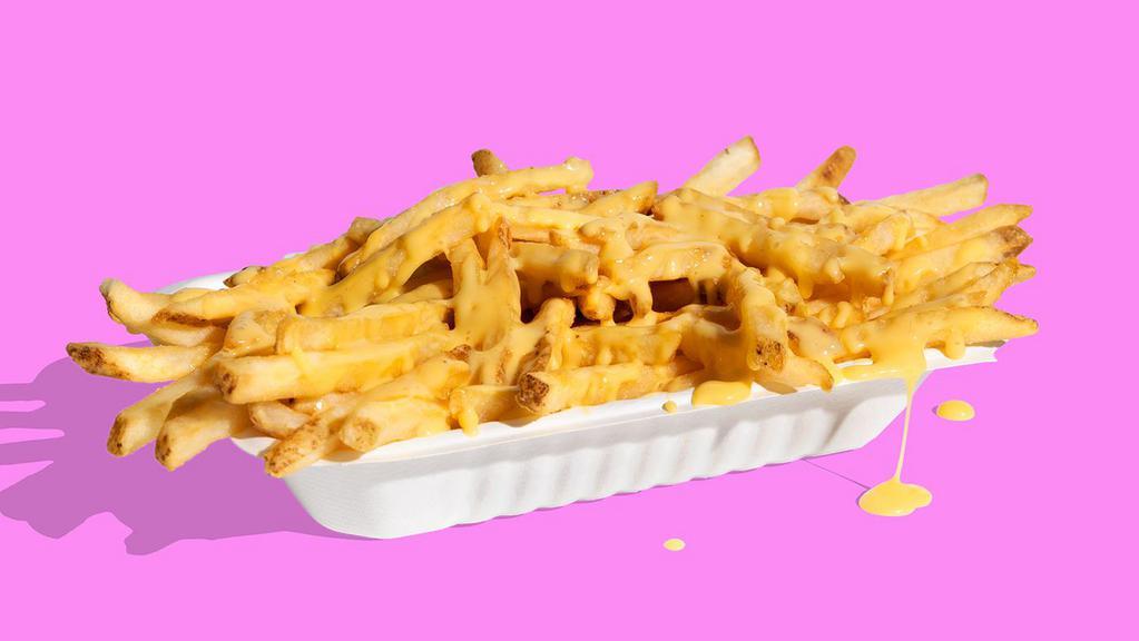 The Shop Cheese Fries · An ooey-gooey-cheesy good time. Shop Fries served with plant-based cheese sauce.