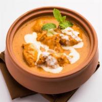 Butter Chicken · Butter Chicken a' la carte or Combo with rice pilaf, roti, and salad.