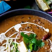 Dal Makahni · Black Dal (lentils) & Red Kidney Beans cooked in creamy tomato sauce.