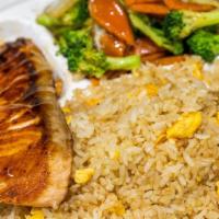 Hibachi Salmon · Served with  Egg Fried Rice, Vegetables (broccoli, onion, carrot) and  with ONE yum yum sauce.