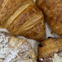 1 Dozen Croissants · A flaky french pastry. your choice of flavors. if you would like multiples of a certain flav...