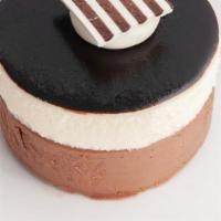 Chocolate Trilogy Cake  · Chocolate cake, dark & white chocolate mousse, vanilla chantilly