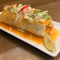 Grilled Fish Burrito · Alaskan Cod, spicy cabbage slaw, salsa, beans, rice. and salsa on top