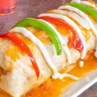 Fajita Burrito · A wet burrito covered in Ranchero Salsa, Choice of filling, mayacoba beans, Mexican rice, pi...