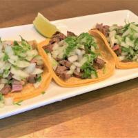 3 Tacos Mexicanos · Soft Organic Corn Tortillas, Choice of Filling, Cilantro, Onions. Choice of Salsa