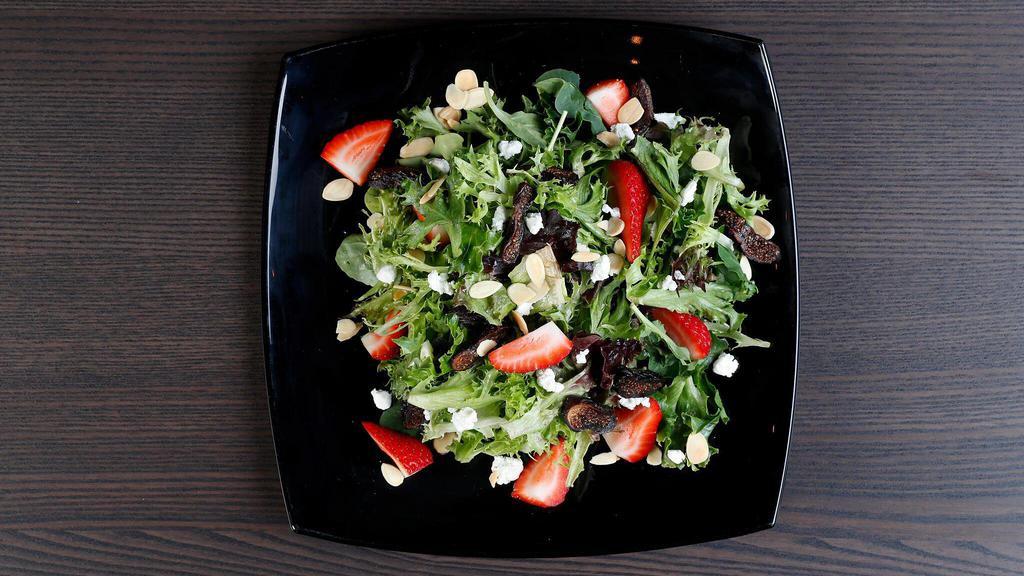 Napa Salad · Mixed greens, goat cheese, strawberries, black figs, and toasted almonds. Served with hazelnut vinaigrette on the side.