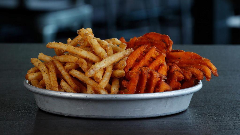 Split Decision (Fries & Sweets) · Skinny-cut French fries and sweet potato waffle fries. Seasoning.