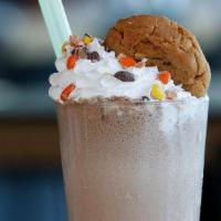 E.T. Shake · Reese's pieces, peanut butter, chocolate and freshly baked peanut butter cookie.