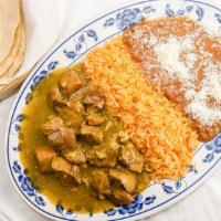 Chile Verde · Pork loin sautéed in a green tomatillo sauce. Served with Mexican rice, refried beans and a ...