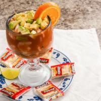 Coctel de Camaron · Shrimp cocktail with fresh tomatoes, onions, cilantro, and avocado chunks. Accompanied with ...