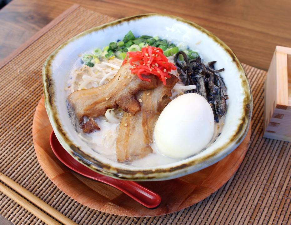 Hakata Tonkotsu · Hakata style ramen with rich pork broth. Chashu pork (simmered pork belly), seasoned soft boiled egg, green onions, kikurage mushrooms, and bean sprouts.