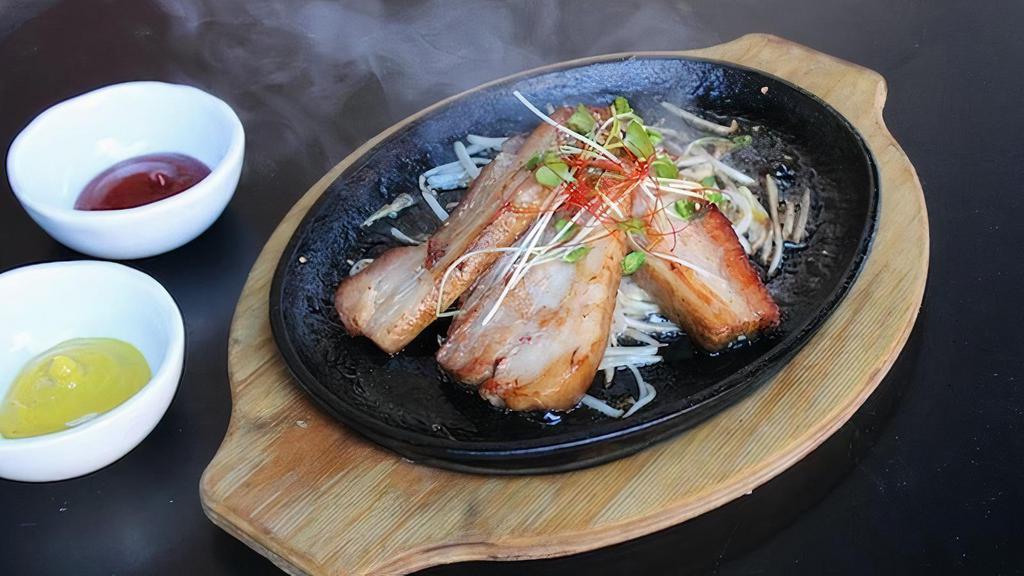 SIZZLING PREMIUM THICK CUT CHASHU · 3pcs of thick cut chashu on very hot sizzling plate. Ingredients: Chashu pork, bean sprouts,. kaiware daikon, red pepper, ketchup,. and mustard on the side.