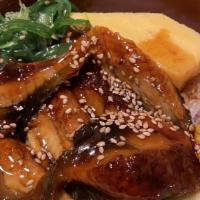Unagi Bowl · BBQ eel over rice with tamago, cucumber, sesame (eel sauce).