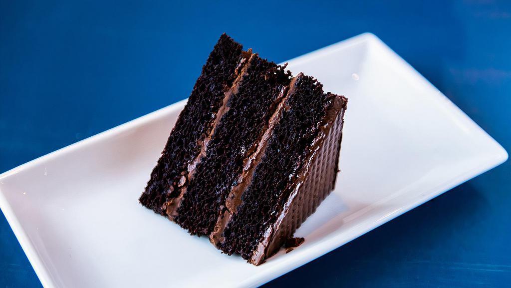 Chocolate Cake · Decadent chocolate cake with chocolate butter cream.