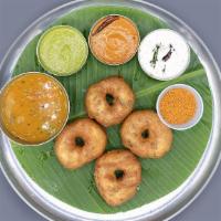 Medhu Vada · Four pieces of medhu vada. Fried lentil donuts.