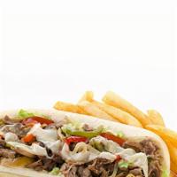 Philly Cheese Steak Sandwich · Grilled onions and bell peppers.