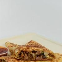 Mushroom Quesadilla · Flour tortilla with cheese, mushroom, red and green bell peppers and onions.