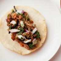 Regular Taco · Corn tortilla, any meat, onions, cilantro and sauce.