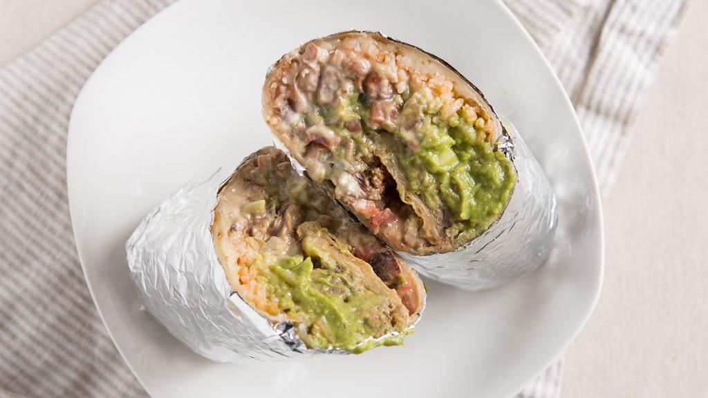 Super Burrito · Any meat, beans, rice, cheese, guacamole, sour cream and salsa.