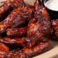 12 Smoked Wings · jumbo wings served naked (dry rub only) . or tossed in your choice of bbq sauce - served wit...