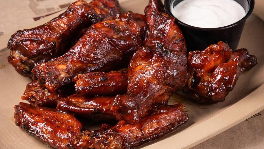 12 Smoked Wings · jumbo wings served naked (dry rub only) . or tossed in your choice of bbq sauce - served with ranch or blue cheese
