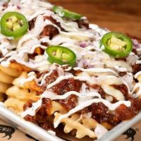 Lg Chili Cheese Fries** · waffle fries, brisket chili, sharp cheddar, . red onion, sour cream and fresh jalapeno