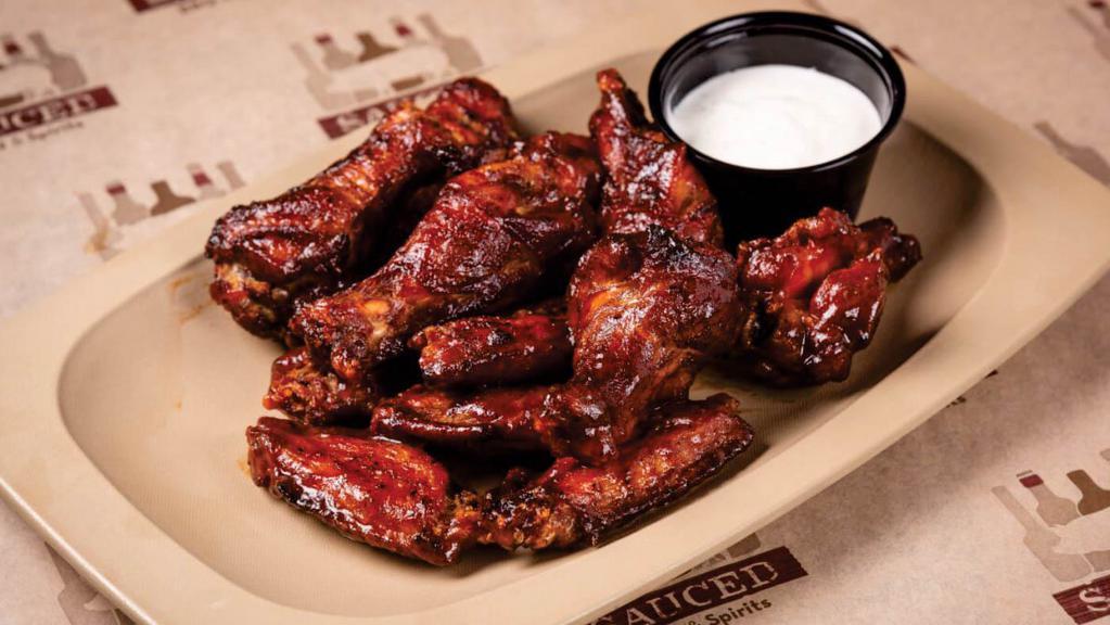 Smoked Wings Plate · jumbo wings served naked (dry rub only) . or tossed in your choice of bbq . sauce - served with ranch or blue cheese