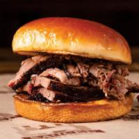 Sliced Brisket Sandwich · served southern style,  no frills on a soft . brioche bun, sauce it up to your liking