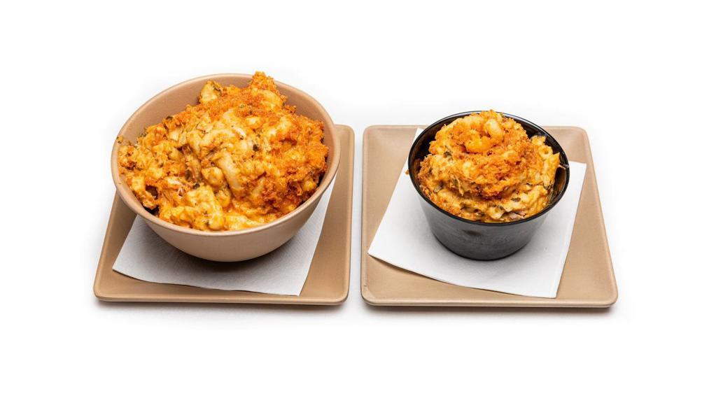 Buffalo Chicken Mac-Share · exactly what it sounds like... our . mac n cheese meets smoked chicken . and house made buffalo sauce
