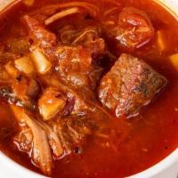 Brunswick Stew - Bowl · thick tomato based stew with pulled pork, . brisket, chicken, corn, lima beans, potatoes, on...