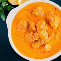 Butter Chicken (BC) · Chicken meat tandoori in our special creamy onion and tomato sauce.