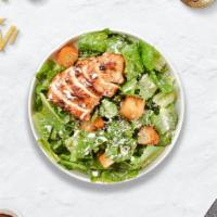 Caesar Chicken Cruncher Salad · Romaine lettuce, grilled chicken, house croutons, and parmesan cheese. Served with a side of...