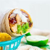 Chile Verde Burrito · Delicious Burrito made with Pork cooked in green chili sauce, rice, beans, hot sauce, and pi...