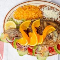 Pescado Frito Tilapia · Fried fish. Served with side.