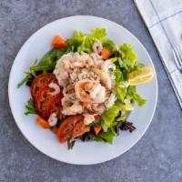Combination Salad · shrimp fresh Dungeness crab meat and prawns over romaine lettuce, organic spring mix, tomato...