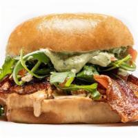 Club Chick Sandwich · grilled chicken, bacon, avocado crema, arugula, roma tomatoes, chipotle ranch