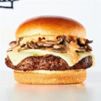 Bounty Hunter Burger · Charbroiled burger, sautéed mushrooms in truffle butter, pepper jack cheese & Mob Sauce